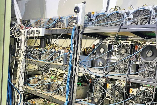 Police find bitcoin mine using stolen electricity in West Midlands | Bitcoin | The Guardian