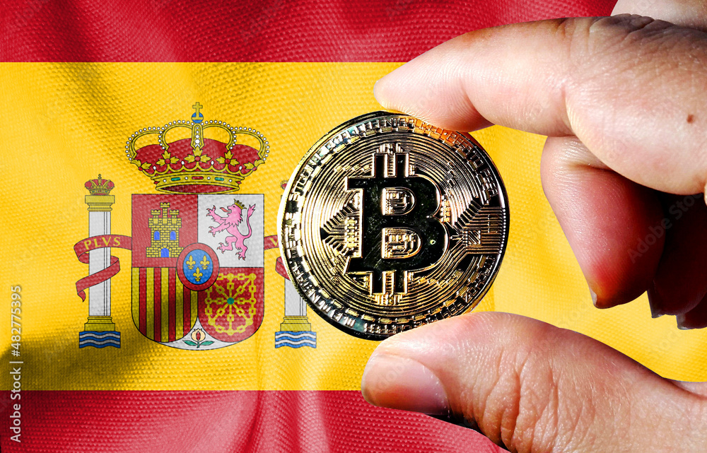 Premium Photo | Bitcoin spain on flag of spain. bitcoin news and legal situation in spain concept.